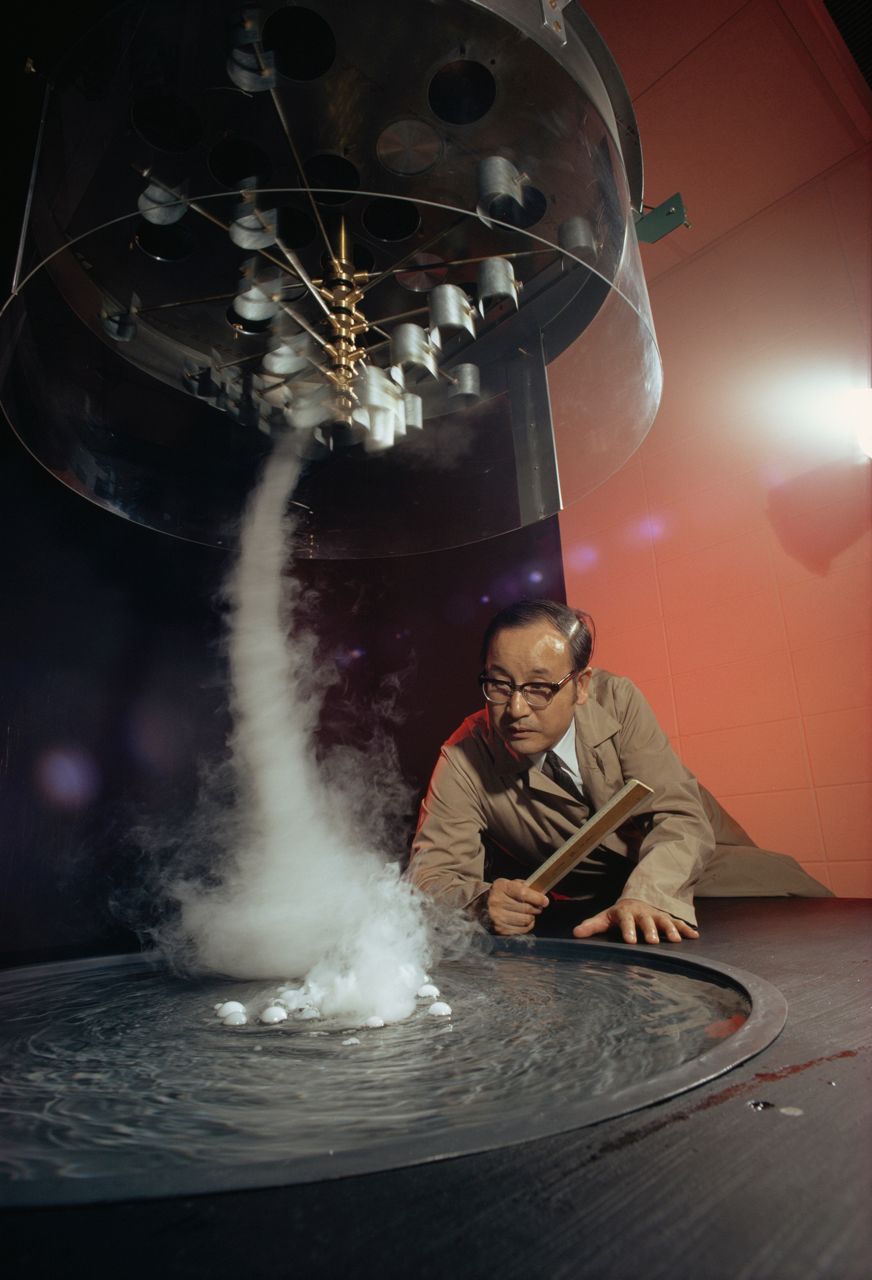 Tetsuya Fujita studies a tornado formation in his lab at the University of Chicago.