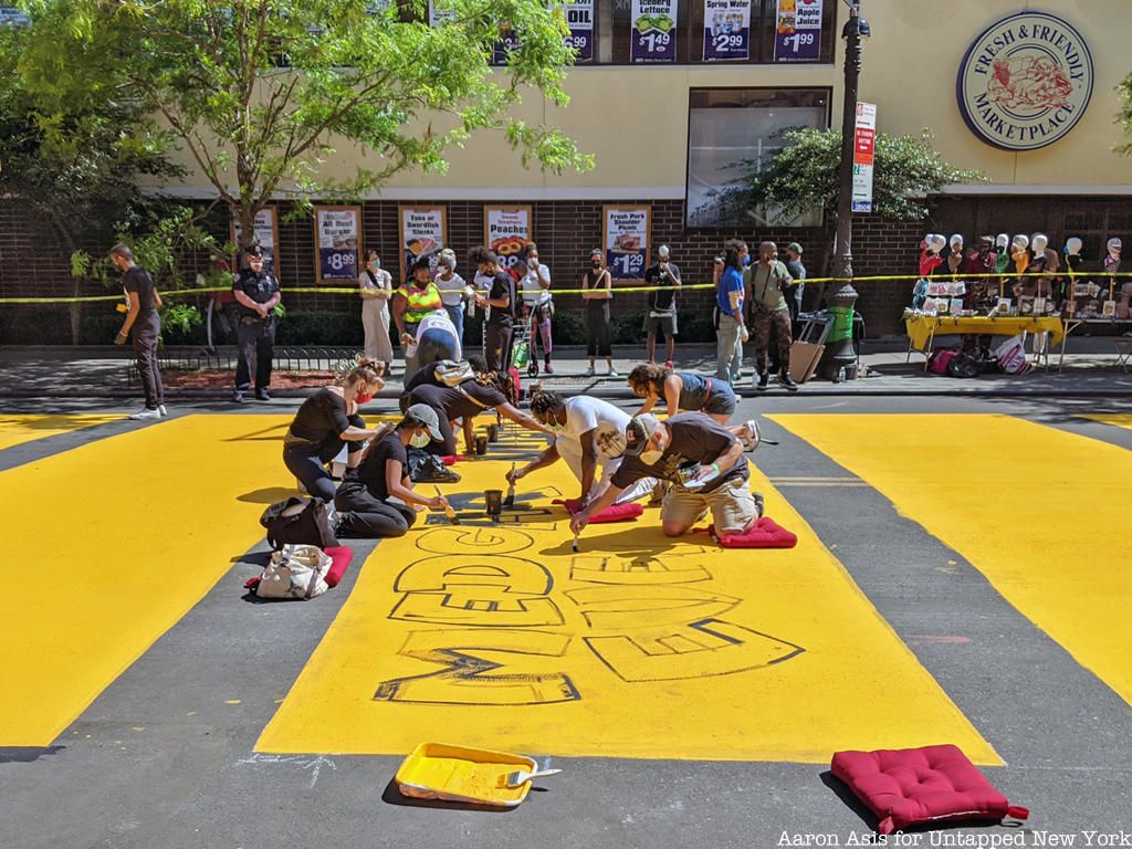 Volunteers Painting Black Lives Matter mural