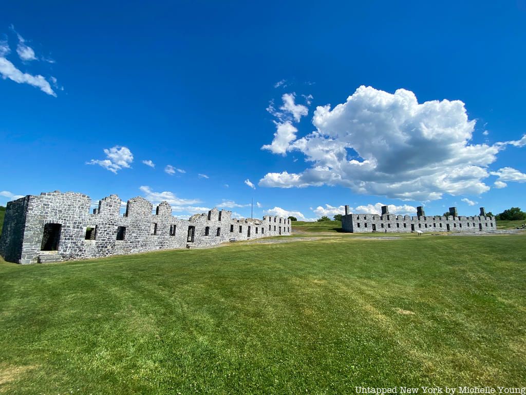 Fort Crown Point buildings and grassy area