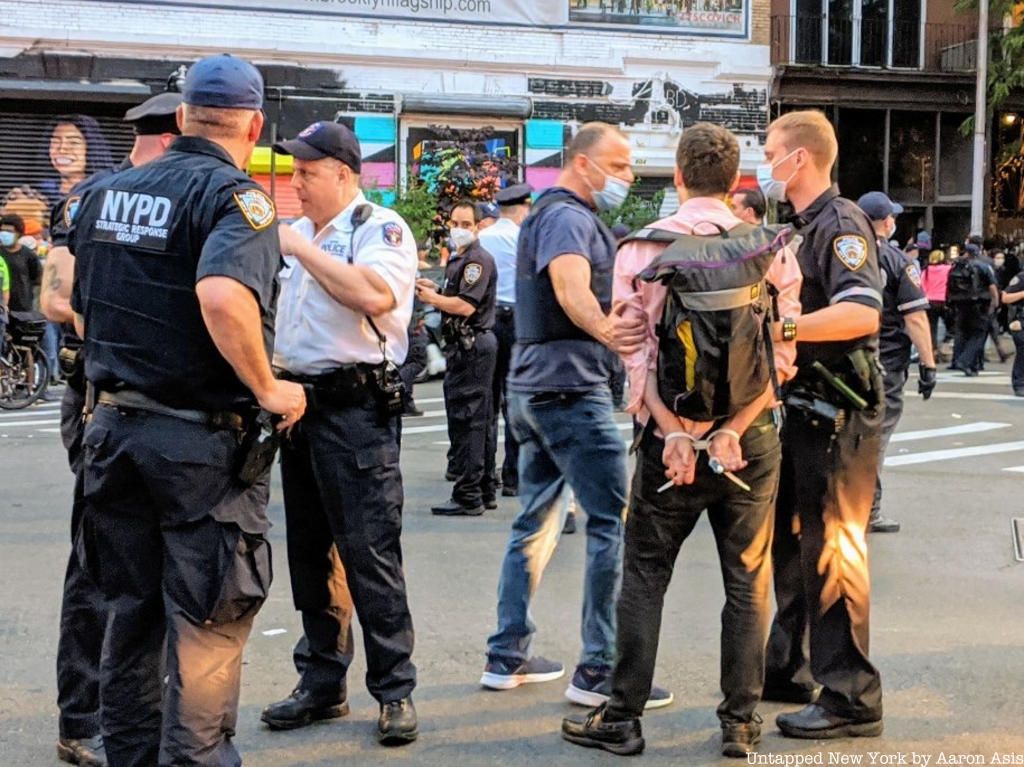 Police arresting protester at George Floyd Protests in Brooklyn Flatbush Avenue