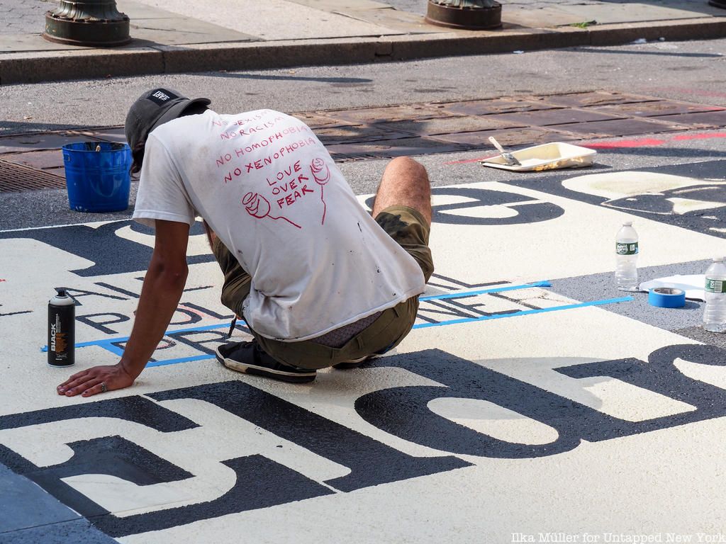 Artist working on Black Lives Matter Mural in Foley Square