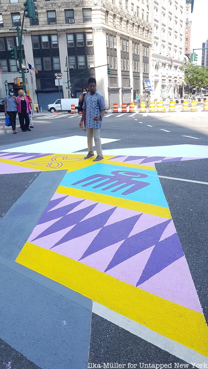 Black lives Matter mural with artist