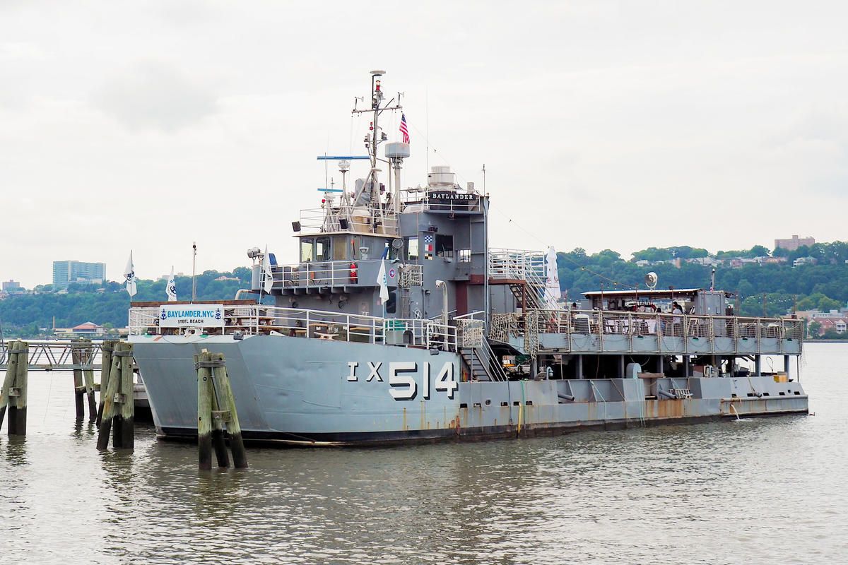 The USS Baylander, once the world's smallest aircraft carrier, docked at West Harlem Pier