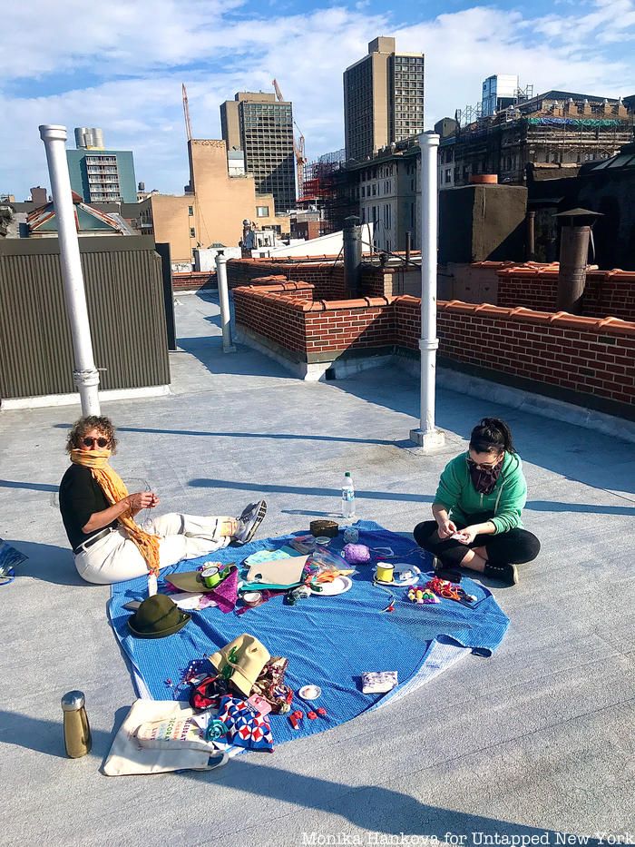 New Yorkers dining on rooftop with masks