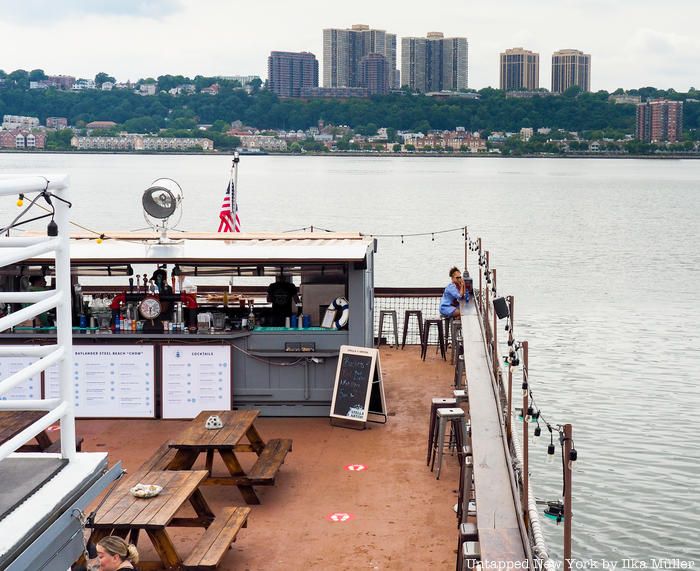 An overhead shot of the outdoor seating aboard he USS Baylander