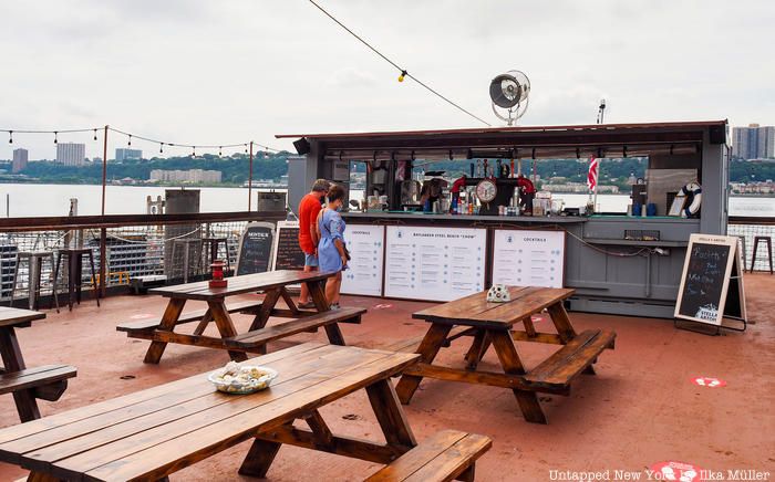 Outdoor seating on the deck of aircraft carrier USS Baylander