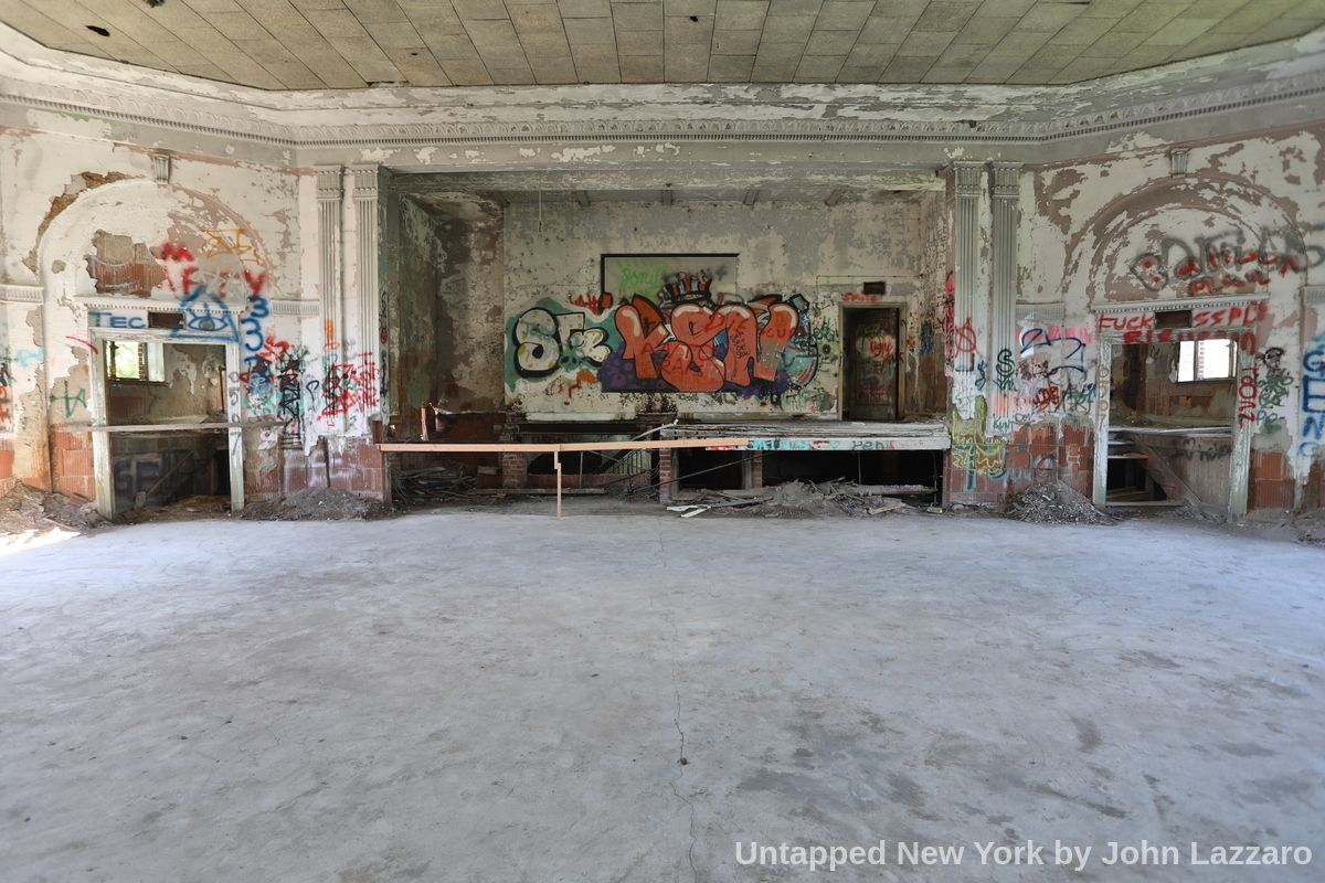 Graffiti on a wall in an abandoned room