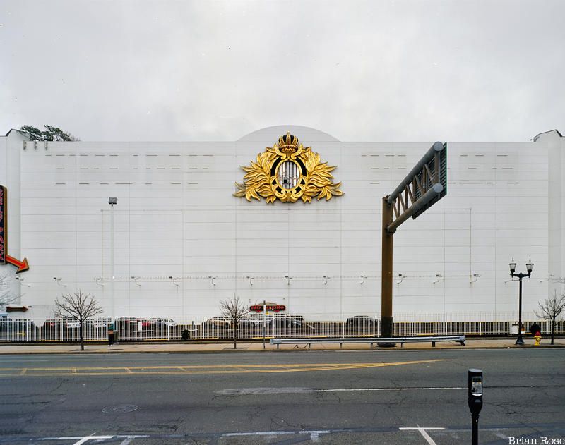 Trump Plaza hotel and casino building with gold crest by road