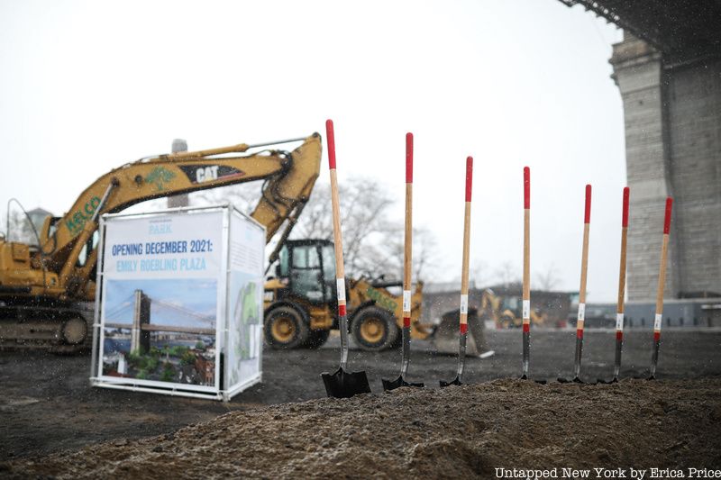 shovels and tractor at Emily Roebling Plaza