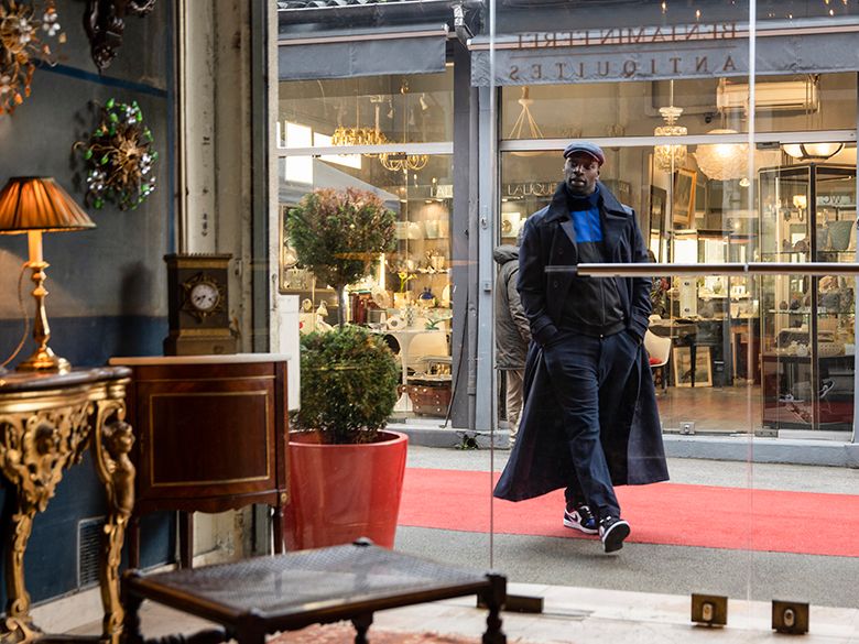 Omar Sy in Les Puces in Paris, filming location for Lupin