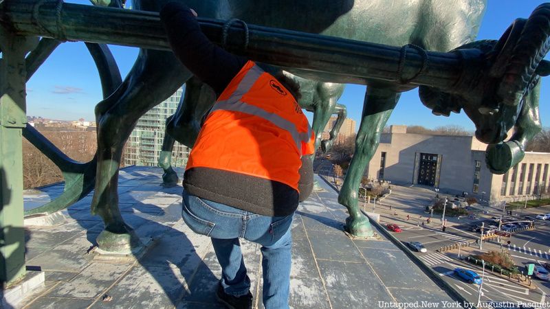 Alden Maddry under the sculptures atop the Soldiers' and Sailors' Memorial Arch