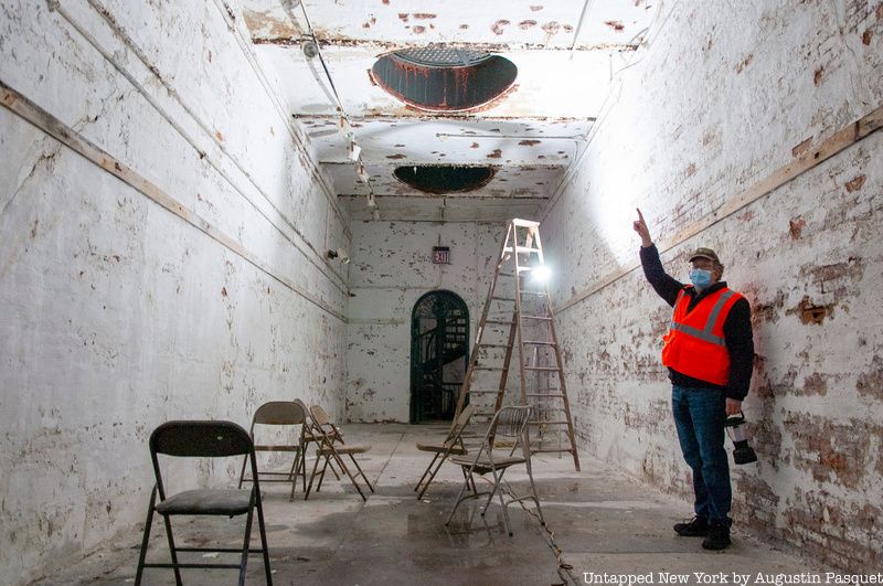 Alden Maddry pointing at roof of Trophy Room