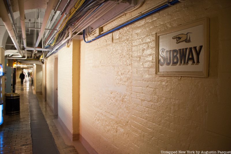 Tunnel with sign for subway under Capitol Hill