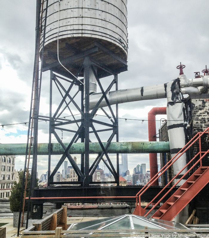 Pipes below a water tower