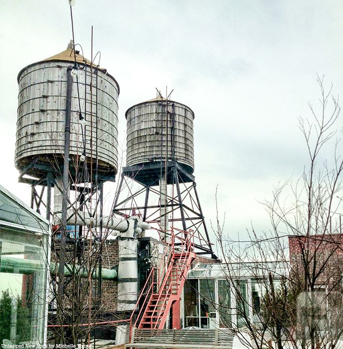 Two water towers on top roof in Chelsea