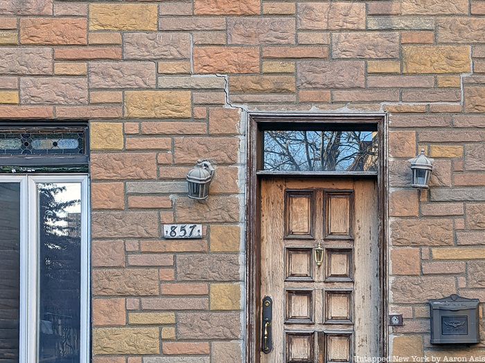 857 Riverside Drive door number and wooden door