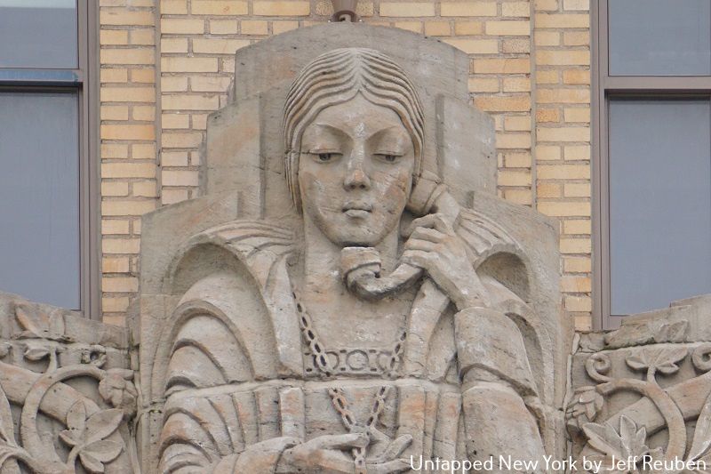 Sculpture that depicts telephone company employees on the Walker House apartments