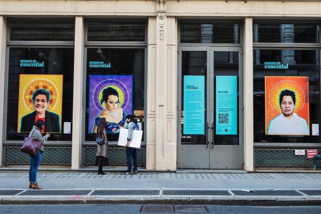 Immigrants are Essential public portrait installation by artist and activist Paola Mendoza in Soho.