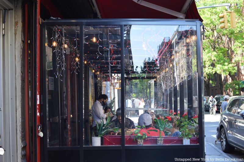 Looking into the window of Lombardi's.