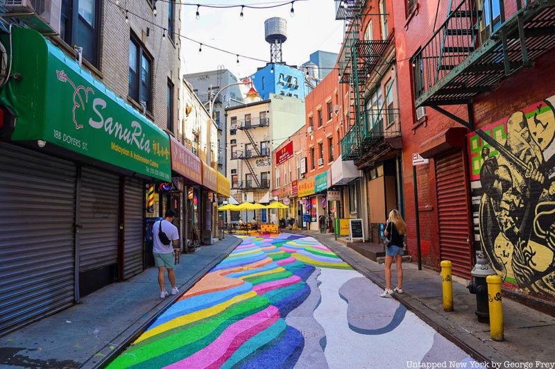 Doyers Street decorated with Dasic Fernández's colorful mural