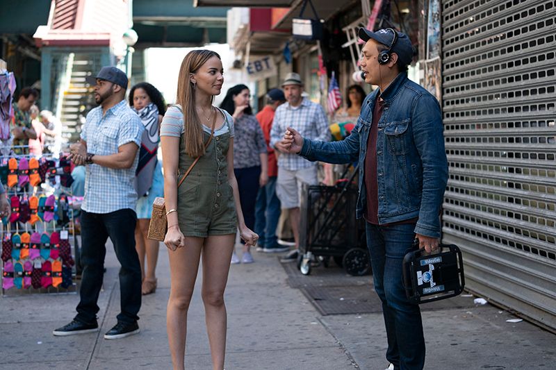 LESLIE GRACE and director JON M. CHU on the set of Warner Bros. Pictures’ “IN THE HEIGHTS,” a Warner Bros. Pictures release.