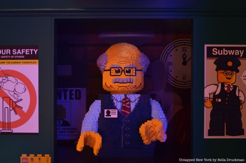 A lifesize Subway employee made of LEGO blocks. 