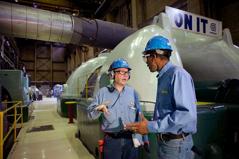 Workers inside Con Edison steam plant