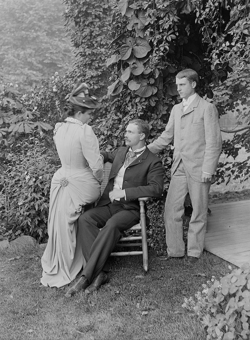 two men and a woman in Victorian garb