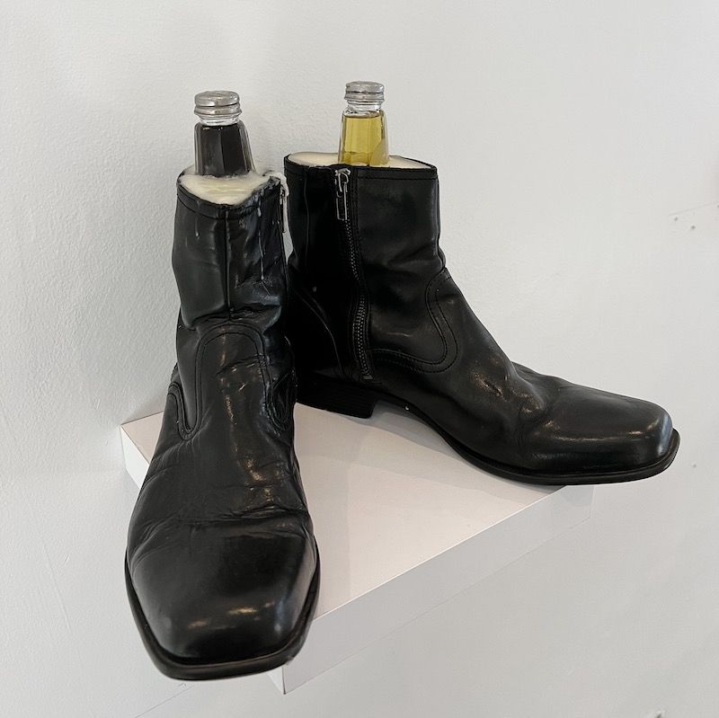 boots with salt and pepper shakers filled with scents