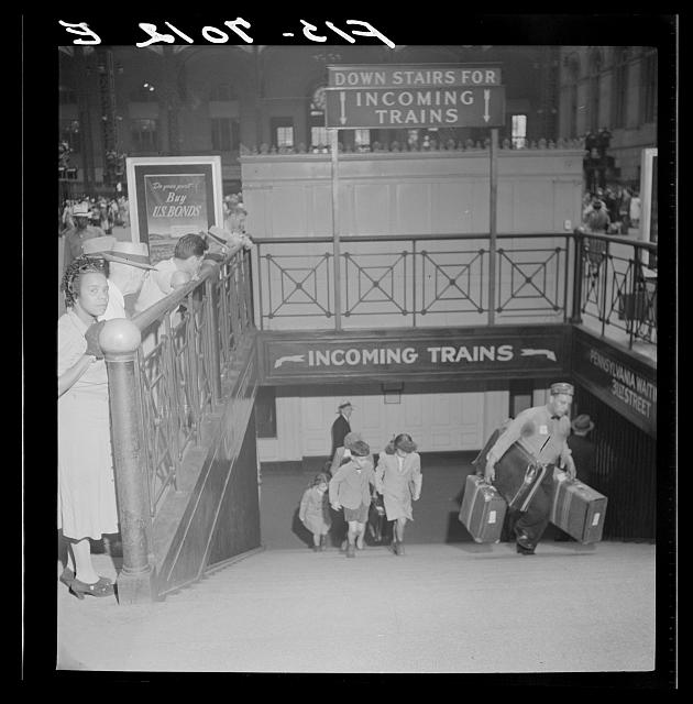 Downstairs for Incoming Trains sign