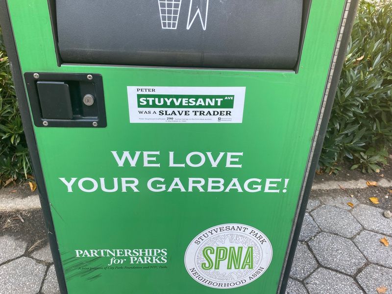 Slavers of New York sticker on trash-can. 