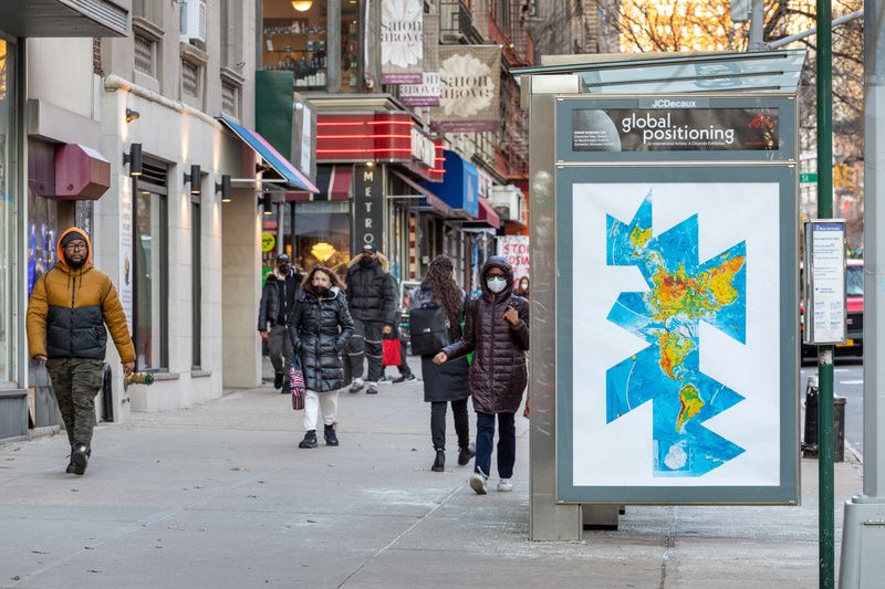 Kwan Sheung Chi's "Dissected Map (Based on Buckminster Fuller's Dymaxion Airocean World)" at NYC bus stop