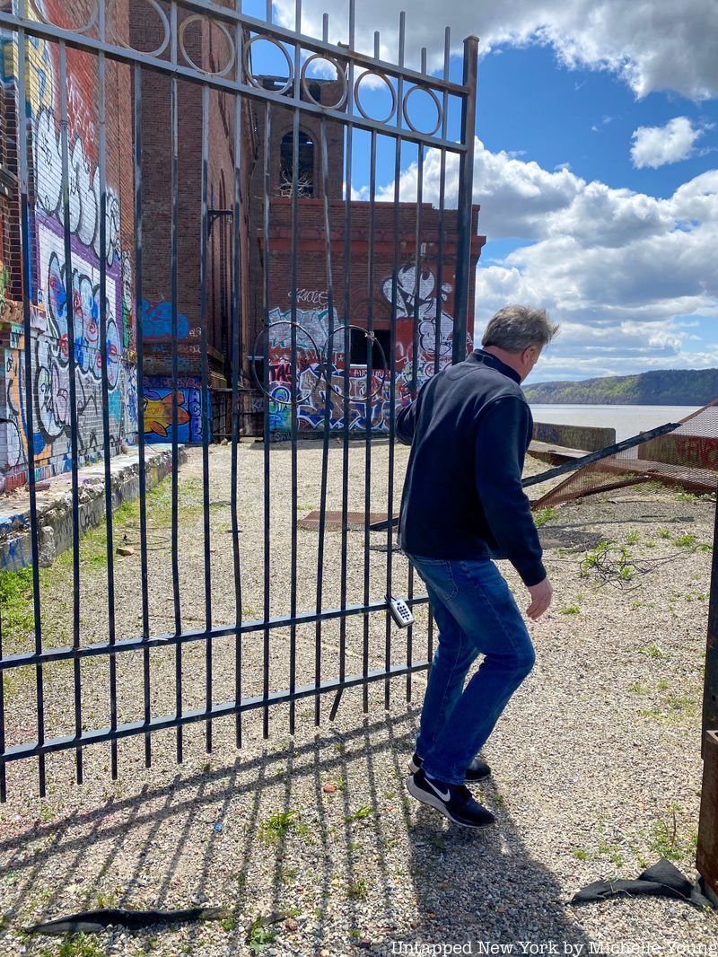 Brian Lindsey head of construction opening gate to Glenwood Power Plant