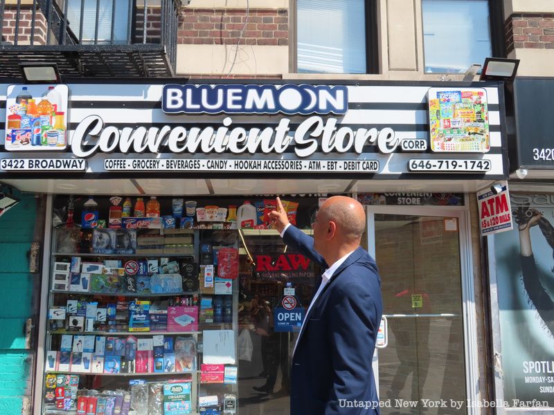 Jose Alba stands in front of Bluemoon Convenient Store, where the incident occurred.