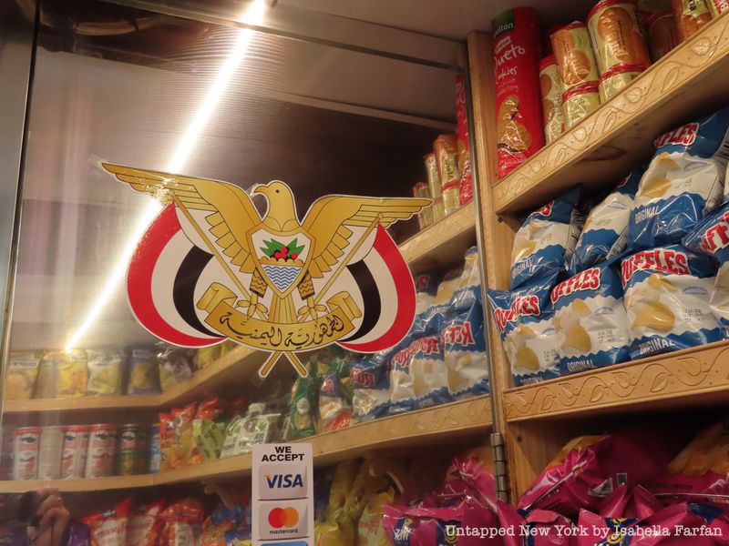 Emblem of Yemen on a bodega mirror.