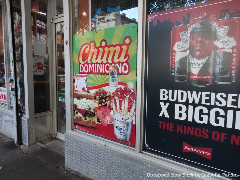 An ad for Chimi Dominicano, also known as the Dominican burger, outside a bodega near Columbia University.