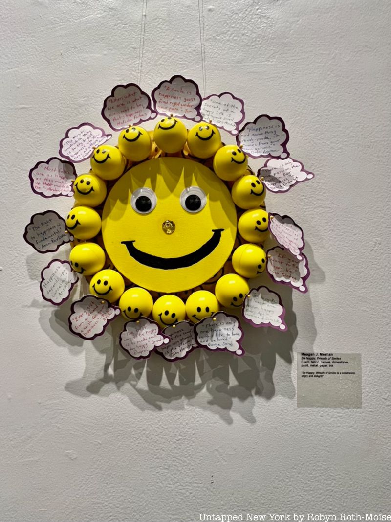 A wreath made of  yellow smiley faces