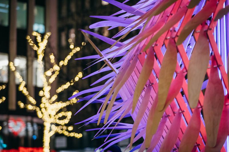 A close up of the fan like arms of the Living Lantern art installation in the Garment District