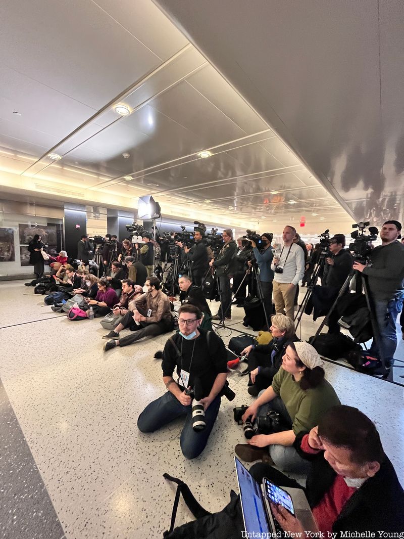 Crowd of press photographers, videographers, and reporters