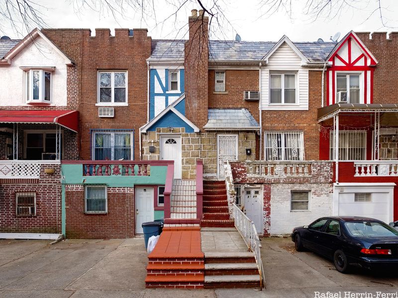 A mish-mash of brick and stucco facade houses in Queens