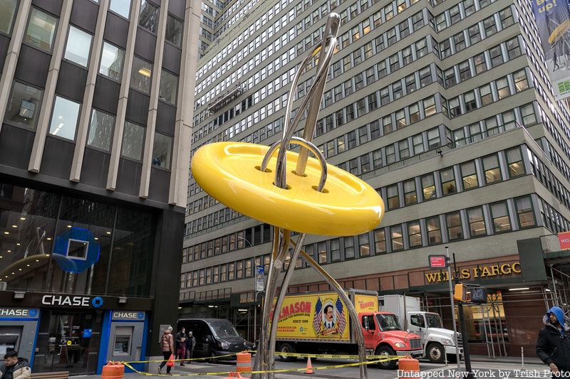 The new yellow Big Button sculpture in Manahattan's Garment District, NYC