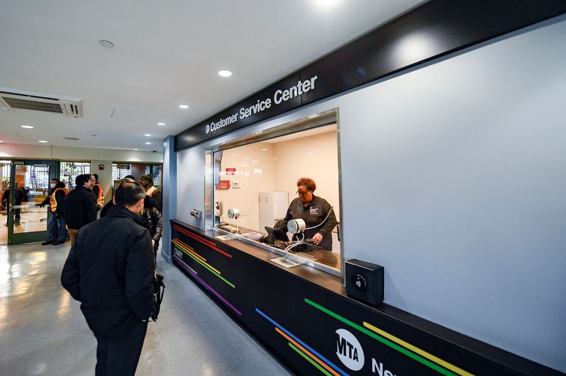 A MTA worker assist a customer at new MTA Customer Service Center at the Coney Island subway station