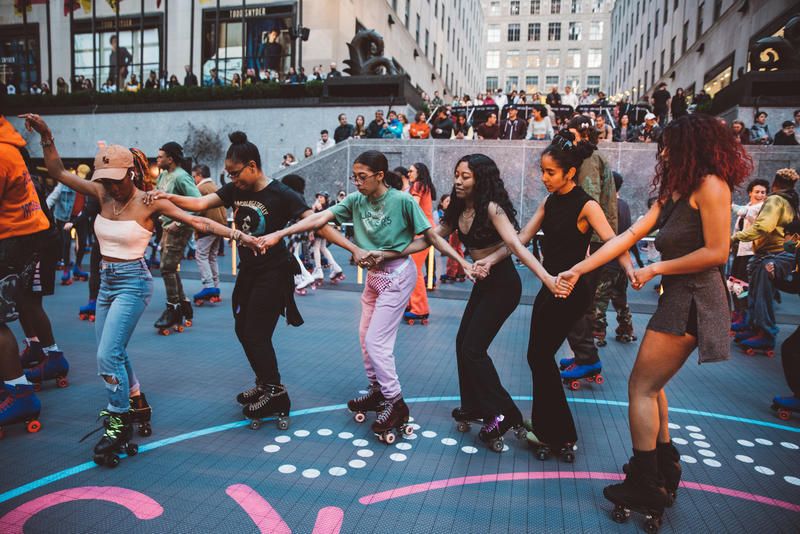 Skaters at the Rockefeller Center roller rink