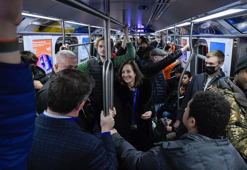 Passengers aboard the new subway cars