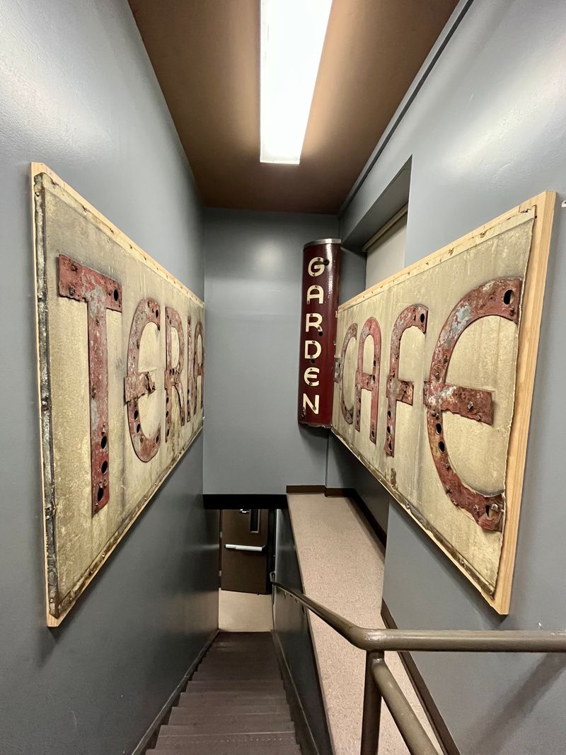 Garden Cafeteria sign hanging in a stairwell