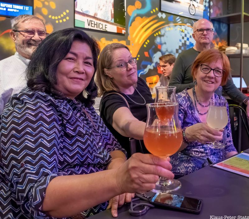 A group of Untapped New York Insiders cheers at the Bronx Brewery