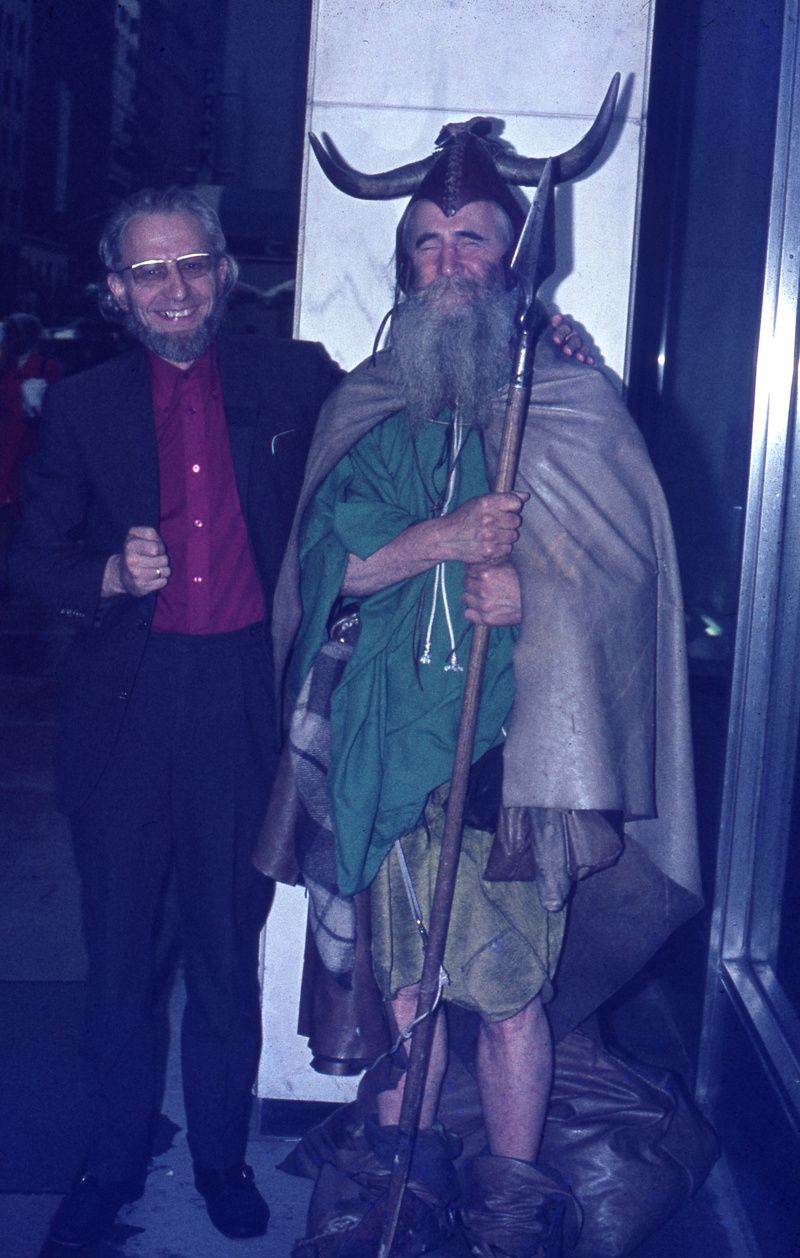 Moondog standing next to another man