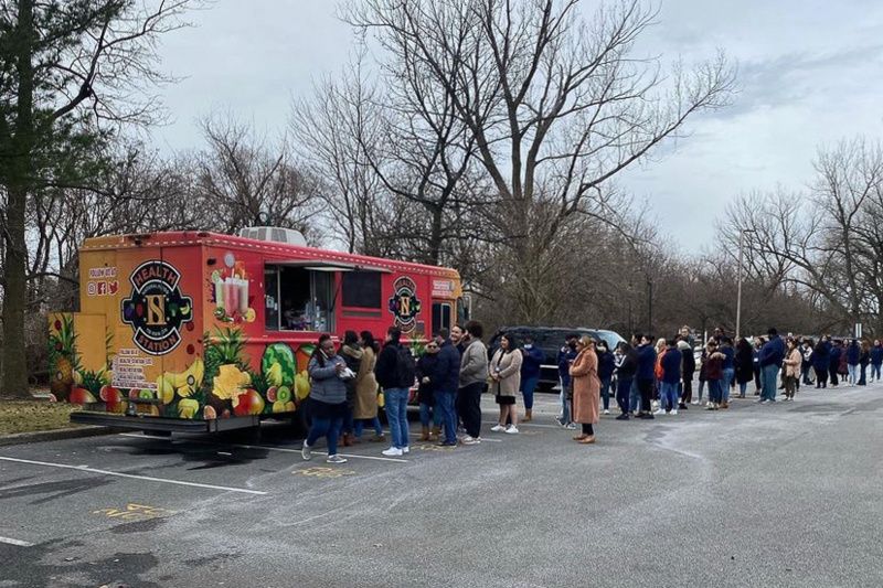 Health Station food truck with a long line