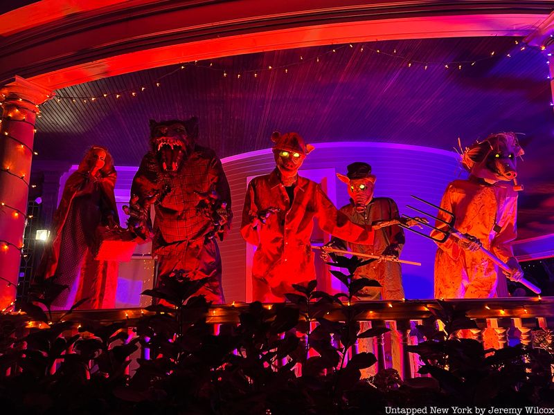 animatronic Halloween figures on a porch