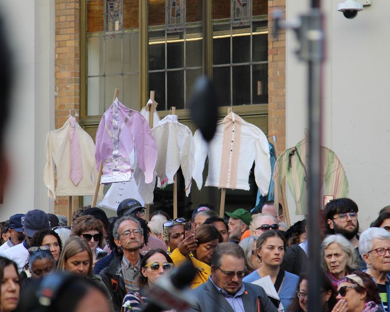 A crowd at the Triangle Fire Memorial dedication